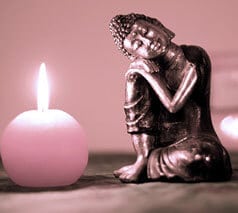 candle and statue